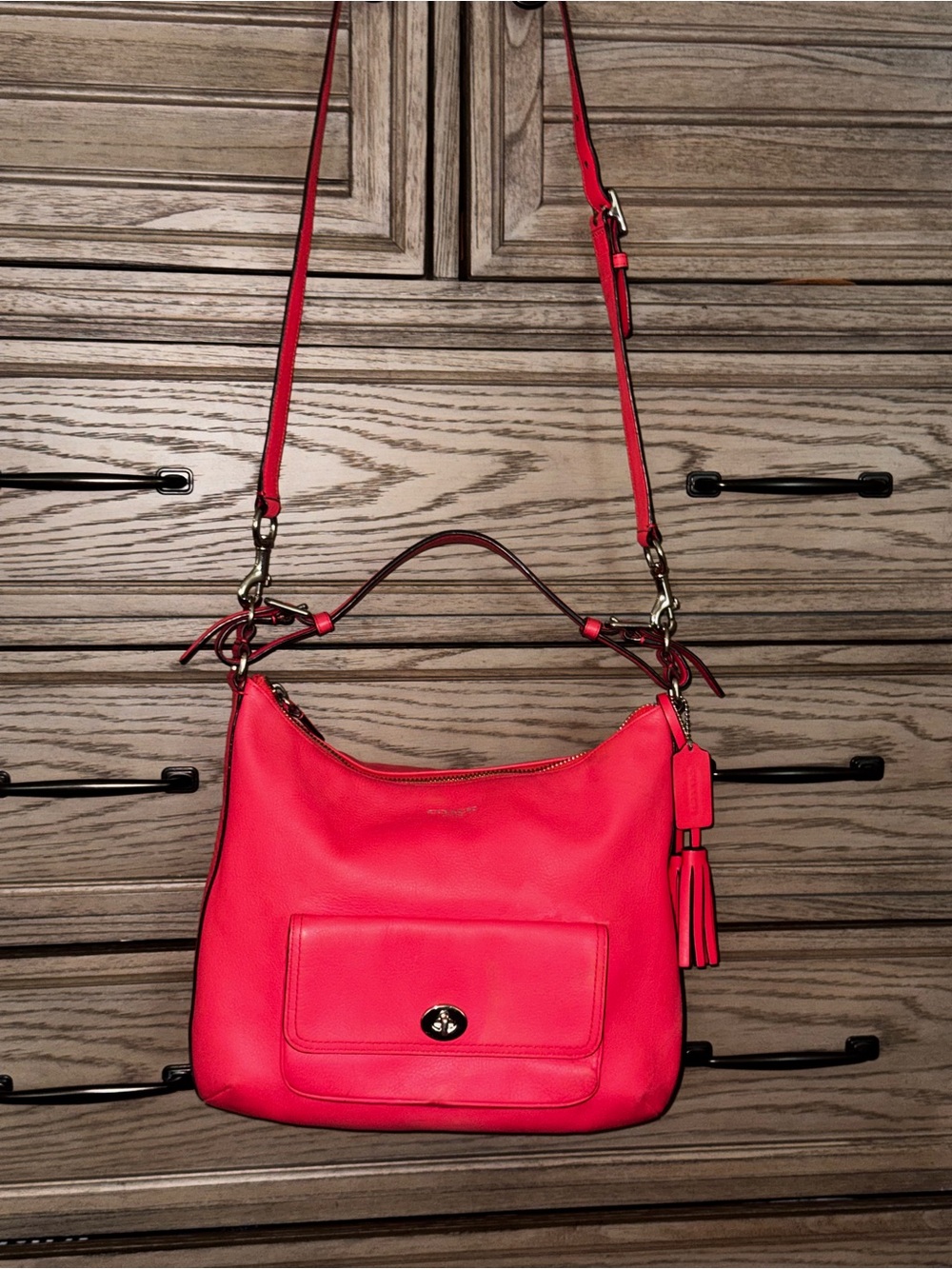 LIKE NEW, Coach deep coral hobo turnlock crossbody.